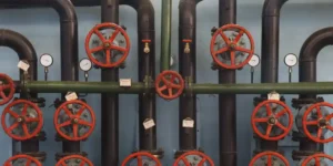 快开隔膜压滤机机械手链条拉紧座的技术改造